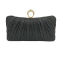 Black Pleats holding a party bag